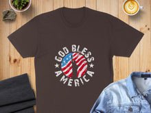 Load image into Gallery viewer, Brown t-shirt with "God Bless America" text and American flag graphic.