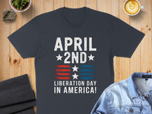 Load image into Gallery viewer, T-shirt with "April 2nd Liberation Day in America" text and American flag design.