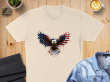 Load image into Gallery viewer, Cream t-shirt with eagle graphic featuring American flag wings.