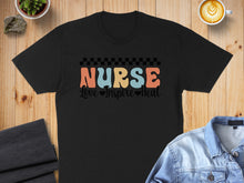 Load image into Gallery viewer, Black t-shirt with "Nurse Love Inspire Heal" text in colorful wavy font.