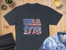 Load image into Gallery viewer, Dark grey t-shirt with "USA 1776" in American flag pattern.