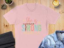Load image into Gallery viewer, Pink t-shirt with "She is STRONG" and "PROVERBS 31:25" text.