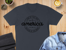 Load image into Gallery viewer, Dark t-shirt with "America, Land of the Free Since 1776 Because of the Brave" text.