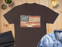 Load image into Gallery viewer, Brown t-shirt featuring a rustic American flag made of patchwork fabric.