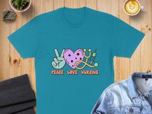 Load image into Gallery viewer, Teal t-shirt with "Peace Love Nursing" text and graphics.