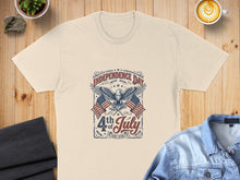 Load image into Gallery viewer, Cream t-shirt with "Independence Day 4th of July EST 1776" and American flags graphic.