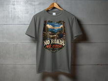 Load image into Gallery viewer, T-shirt with graphic "NO ROADS NO NOISE JUST RADIO" and mountain radio scene.