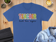 Load image into Gallery viewer, Blue t-shirt with "TEACHER" in colorful polka dot letters and "teach love inspire" below.