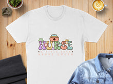Load image into Gallery viewer, White t-shirt with "Nurse Above Queen" text and floral design.