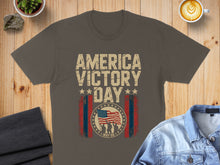 Load image into Gallery viewer, T-shirt with "America Victory Day May 08" and American flag graphic.
