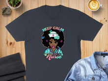 Load image into Gallery viewer, Dark t-shirt with "Keep Calm I'm a Nurse" text and nurse illustration.