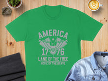 Load image into Gallery viewer, Green t-shirt with "America 1776 Land of the Free Home of the Brave" and eagle graphic.