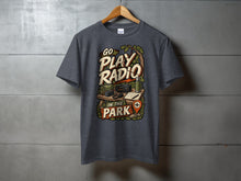 Load image into Gallery viewer, T-shirt graphic with text "Go Play Radio in the Park" and camping radio gear.