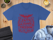 Load image into Gallery viewer, Red graphic on blue t-shirt: Faith and Family and Freedom 1776-2026.