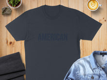 Load image into Gallery viewer, Dark gray t-shirt with "AMERICAN" printed in dark blue on chest.
