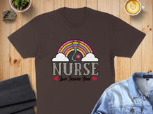 Load image into Gallery viewer, Brown t-shirt with rainbow, stethoscope, and "Nurse Love Inspire Heal" text.