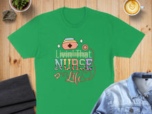 Load image into Gallery viewer, Green t-shirt with "Livin' That Nurse Life" text and medical icons.