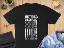 Load image into Gallery viewer, Black t-shirt with "RETIRED MECHANIC FIX IT YOURSELF" text and an American flag design.