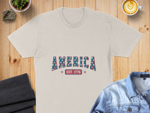 Load image into Gallery viewer, Cream t-shirt with "America Est. 1776" in red, white, and blue stars and lettering.