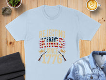 Load image into Gallery viewer, Light blue t-shirt with "Rejecting Kings Since 1776" text and crossed rifles graphic.