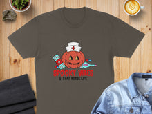 Load image into Gallery viewer, Brown t-shirt with Halloween nurse pumpkin graphic and text.