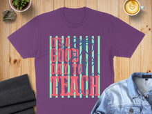 Load image into Gallery viewer, Purple t-shirt with "IT'S A GOOD DAY TO TEACH" text and pencil graphic.