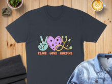 Load image into Gallery viewer, Dark t-shirt with "Peace Love Nursing" text and icons including a stethoscope.