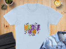 Load image into Gallery viewer, Light blue t-shirt with "NURSE" in colorful Halloween-themed lettering and icons.