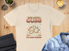 Load image into Gallery viewer, T-shirt with "Some nurses cuss too much" and medical icons.