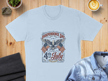 Load image into Gallery viewer, Light blue t-shirt with "Independence Day 4th of July Est. 1776" graphic featuring eagles and flags.