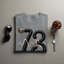 Load image into Gallery viewer, Gray t-shirt with black cable design forming "73" with waveform.