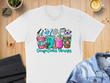Load image into Gallery viewer, T-shirt with "Occupational Therapy" text and colorful coffee cups with medical symbols.