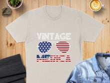 Load image into Gallery viewer, Cream t-shirt with "VINTAGE AMERICA" and sunglasses graphic.