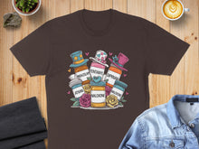 Load image into Gallery viewer, T-shirt featuring cartoon pills labeled Ativan, Midazolam, Diprivan, and Naloxone with hats.