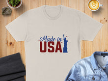 Load image into Gallery viewer, Cream t-shirt with "Made in USA" text and Statue of Liberty graphic.
