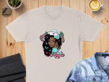Load image into Gallery viewer, Cream t-shirt with Black Nurse Magic graphic featuring a Black nurse with butterflies.
