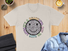 Load image into Gallery viewer, T-shirt with a leopard print smiley face and colorful "it's a beautiful day to save lives" text.