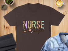 Load image into Gallery viewer, Brown t-shirt with colorful "NURSE life" text and syringe graphic.
