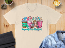Load image into Gallery viewer, T-shirt graphic with coffee cups, medical icons, and "RCA Resident Care Assistant" text.