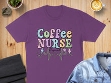 Load image into Gallery viewer, Purple t-shirt with "Coffee Nurse Repeat" text and medical stethoscope graphic.