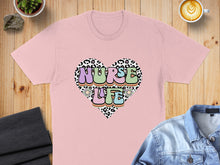 Load image into Gallery viewer, Pink t-shirt with leopard print heart that says "Nurse Life".