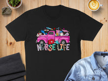 Load image into Gallery viewer, Black t-shirt with pink pickup truck graphic featuring medical supplies and "Nurse Life" text.