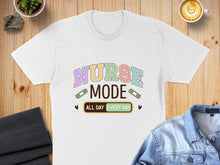 Load image into Gallery viewer, White t-shirt with "Nurse Mode All Day Every Day" text and bandages.