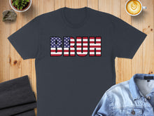 Load image into Gallery viewer, Dark blue t-shirt with "BRUH" in American flag pattern.