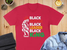 Load image into Gallery viewer, Red t-shirt with "Black Father Black Leader Black King" text and lion graphic.