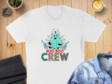 Load image into Gallery viewer, White t-shirt featuring a cartoon ghost nurse and "Boo Boo Crew" text.