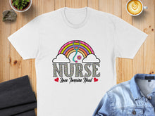 Load image into Gallery viewer, White t-shirt with colorful "Nurse Love Inspire Heal" text and rainbow stethoscope design.