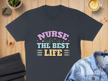 Load image into Gallery viewer, Dark t-shirt with "Nurse is the best nurse" text and syringe graphics.