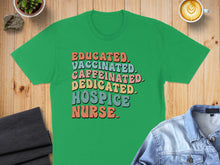 Load image into Gallery viewer, Green t-shirt with "Educated. Caffeinated. Dedicated. Hospice Nurse." text.