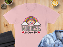 Load image into Gallery viewer, Pink t-shirt with rainbow stethoscope and "Nurse Love Inspire Heal" text.